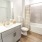 bathroom with shower, sink, toilet