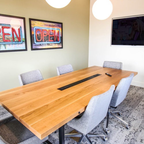 Conference Room conference table with tv and chairs