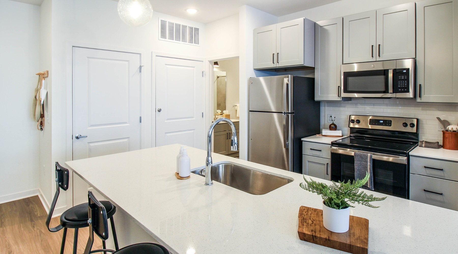 Beautiful kitchens with designer finishes Well-lit kitchen with ample counter space