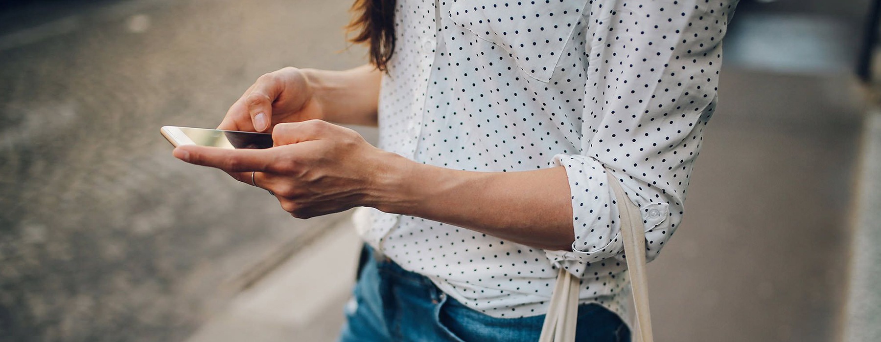 woman holding a cell phone